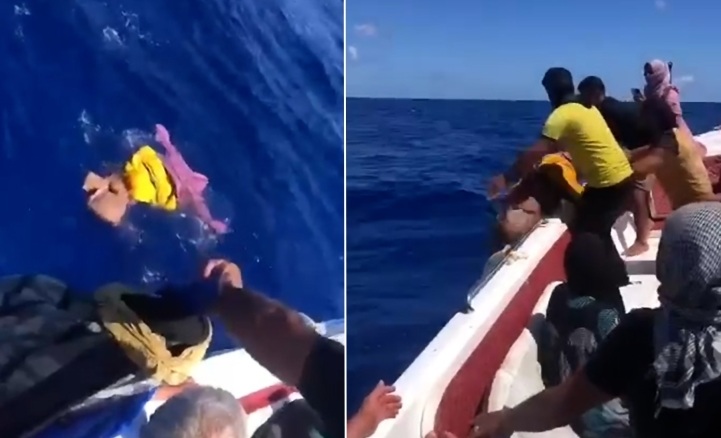 بالفيديو..خلال رحلة هجرة، أب يكفن جثة إبنه بملابسه ويلقي بها في البحر